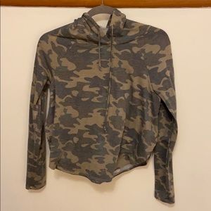 A camo light weight long sleeve with hood.